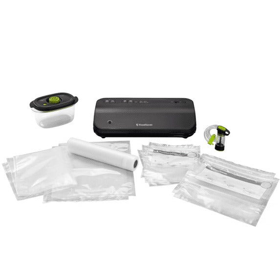 FoodSaver FM2000 Vacuum Sealer Starter System with bags, marinate container and handheld pump